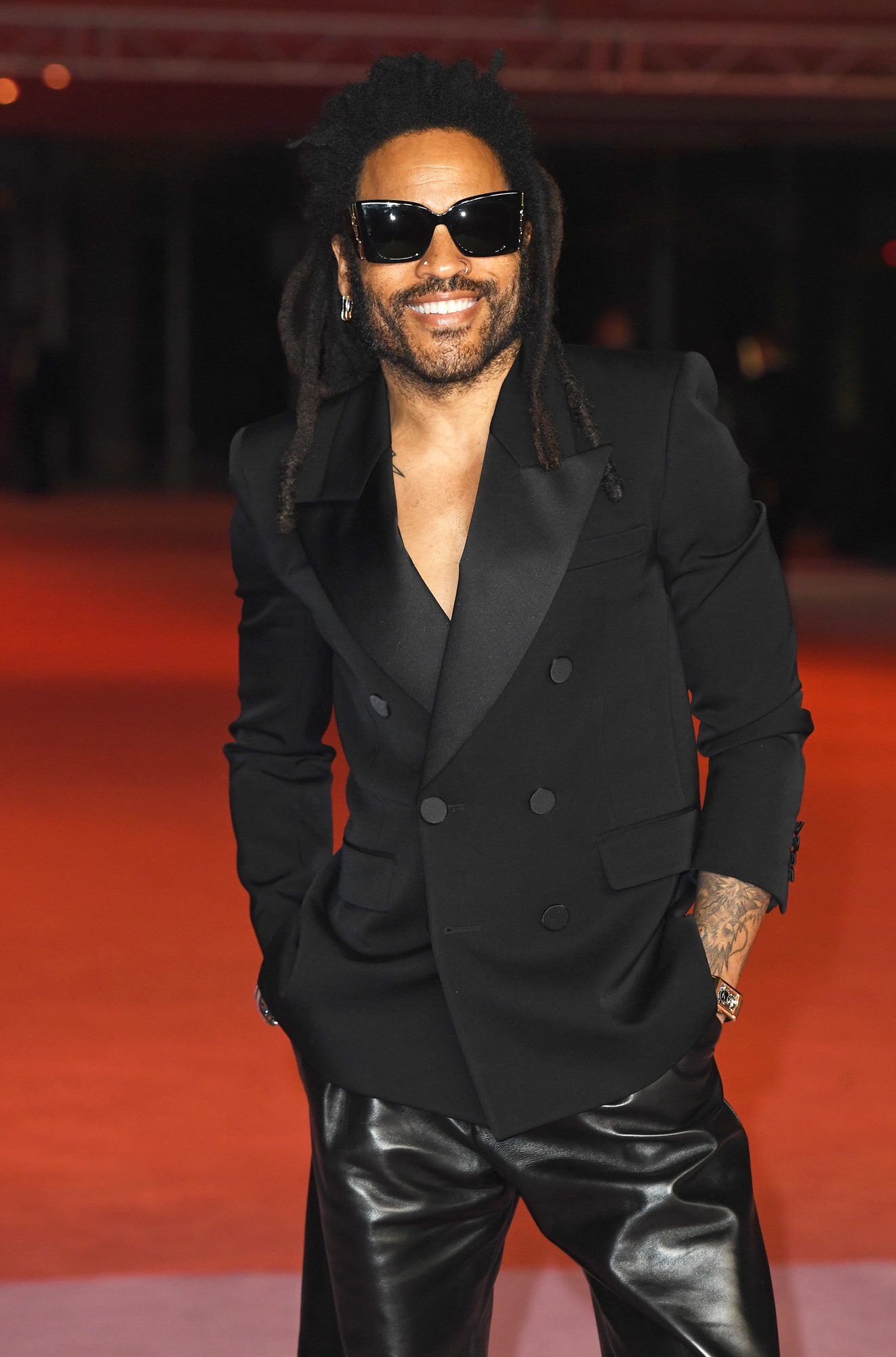 Lenny Kravitz’s Coach Explains Why Singer Wears Leather Pants to the Fitness center